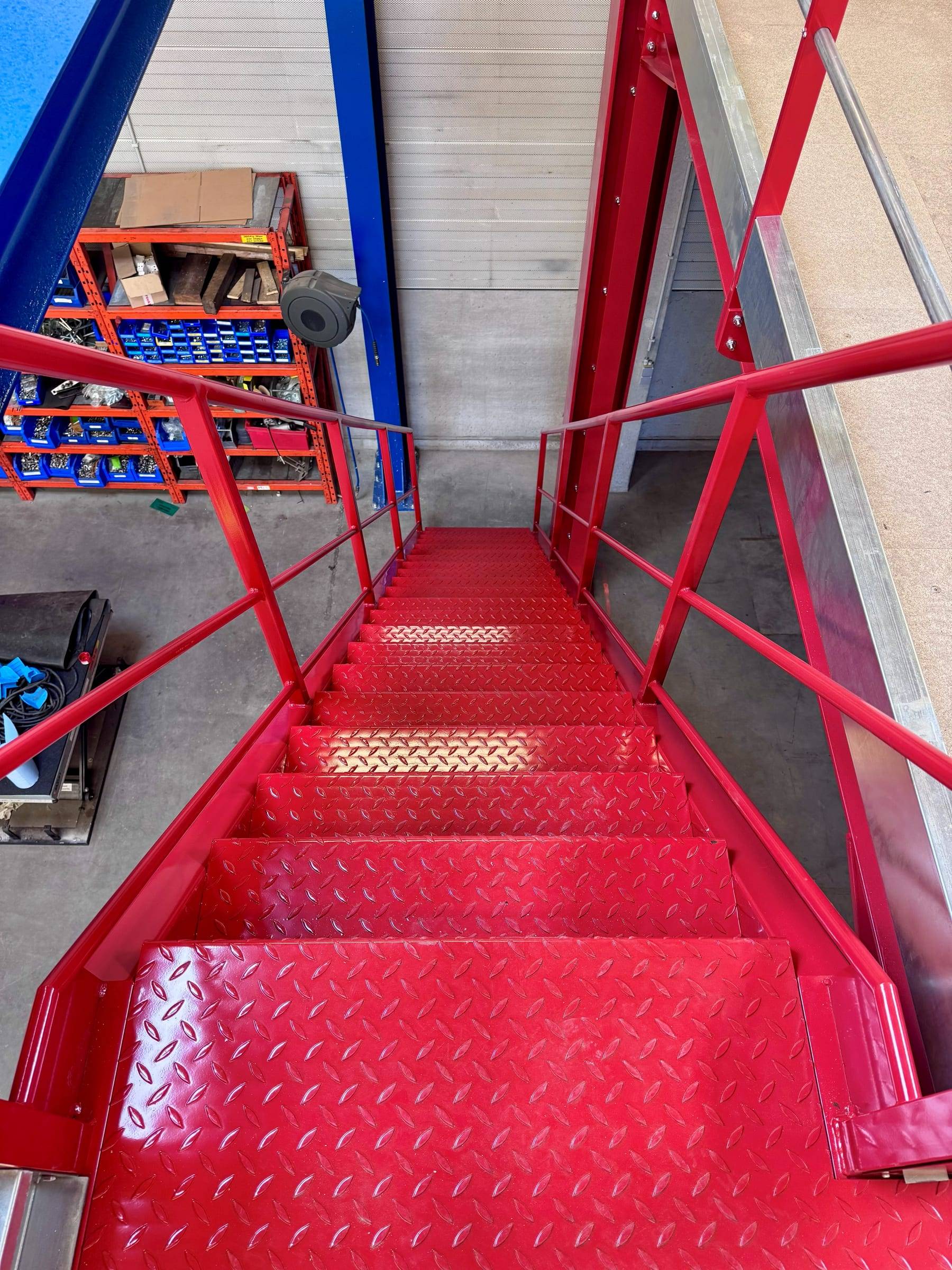 Mezzanine staircase with guardrails and anti-slip treads