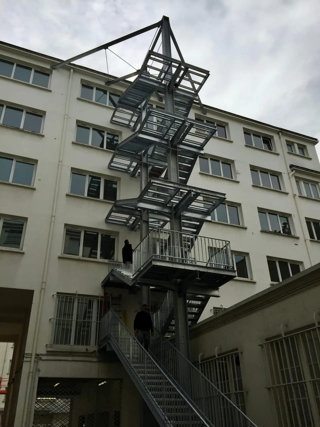 External steel emergency staircase on the facade of a building