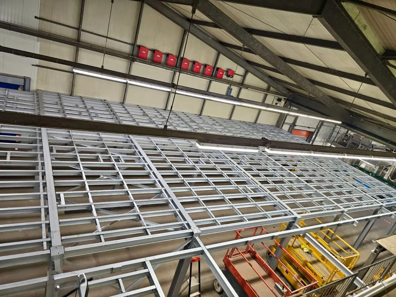 Galvanised steel joists of a warehouse mezzanine before the deck is laid