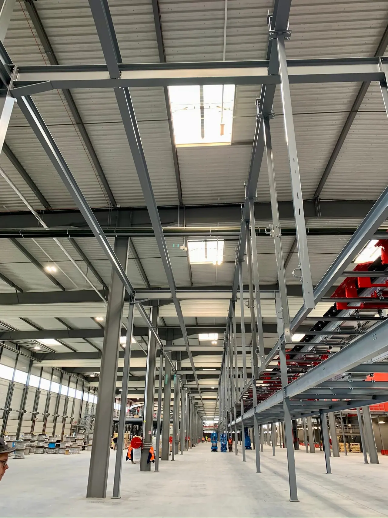 Underside of a warehouse mezzanine on steel columns